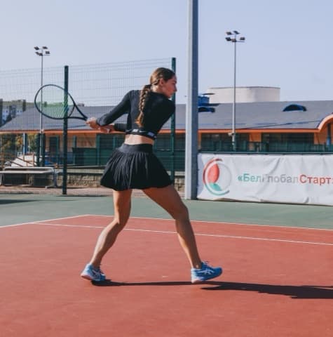 Elena on court at Family Tennis Club